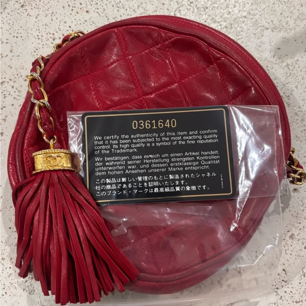 Authentic CHANEL RED LAMBSKIN tassel round mini vintage bag